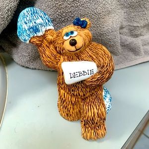 Debbie cheerleader bear statue